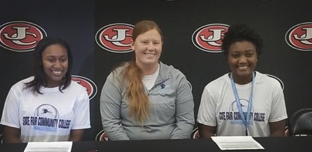 Lady Roadrunners Sign Austell and Bell